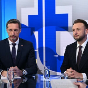 Na telo (11. 1.): Matúš Šutaj Eštok (Hlas-SD) a Milan Majerský (KDH)